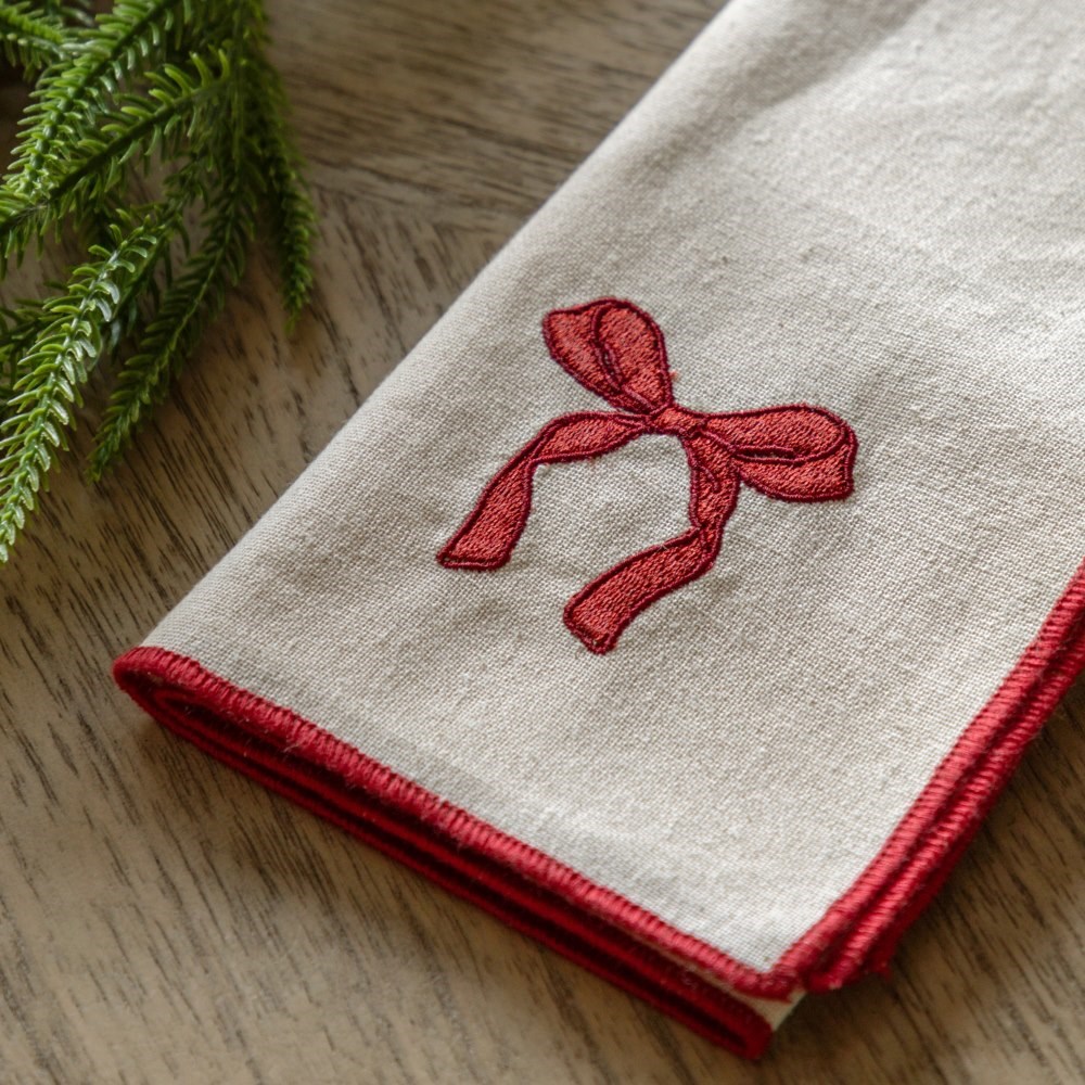 Four bow design napkins