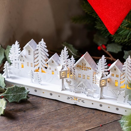 White wooden lit village