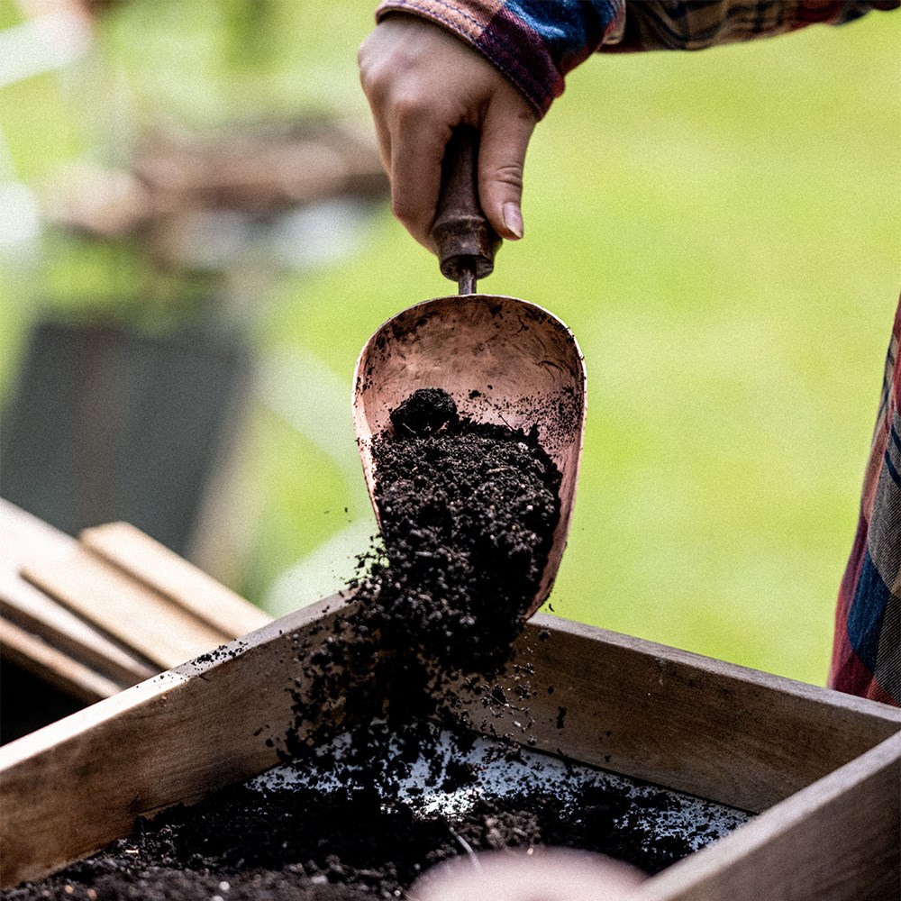 Copper hand compost scoop
