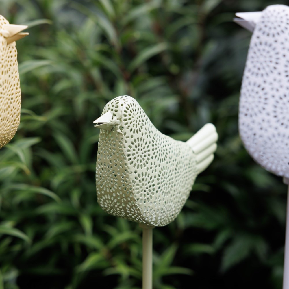 Set of four solar bird lights 