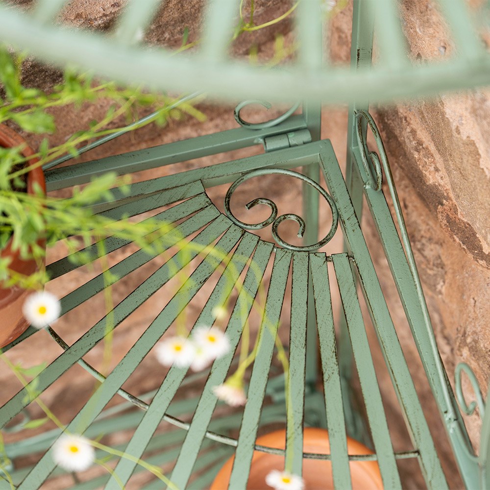 Scroll detail corner pot stand