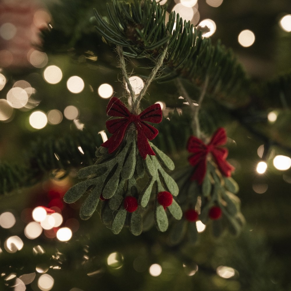 Two small felt mistletoe decorations