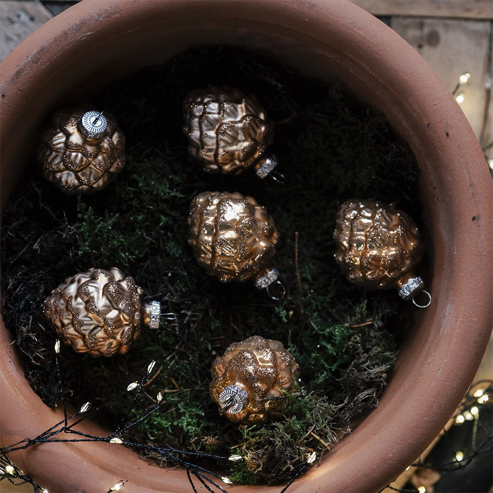 Six glass pinecones