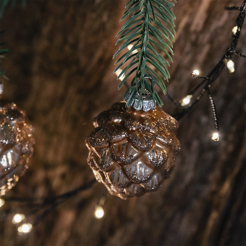Six glass pinecones