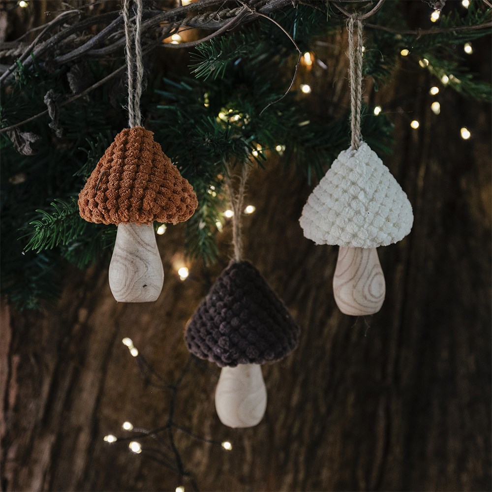 Three wooden mushrooms