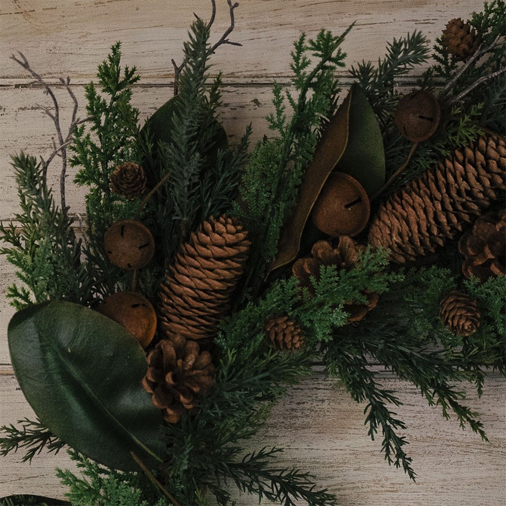 Green wreath with rusty bells
