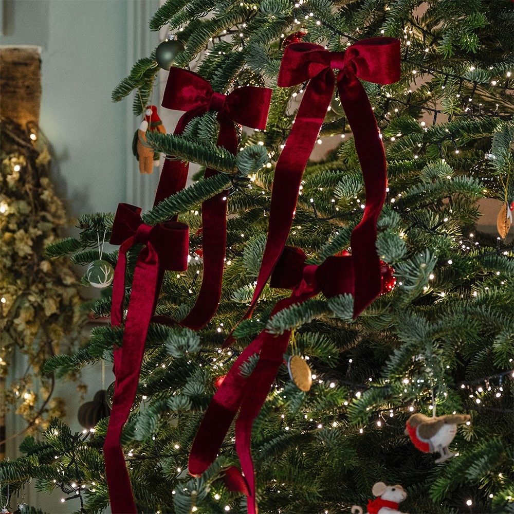 Four red velvet bows