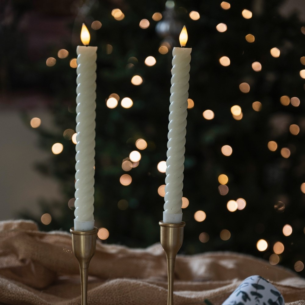 Two LED cream swirl dinner candles