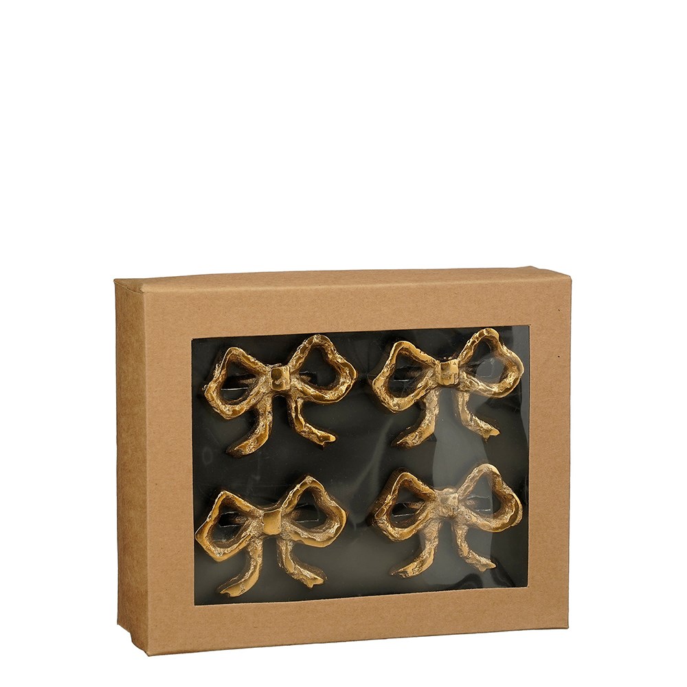 Four gold bow napkin rings