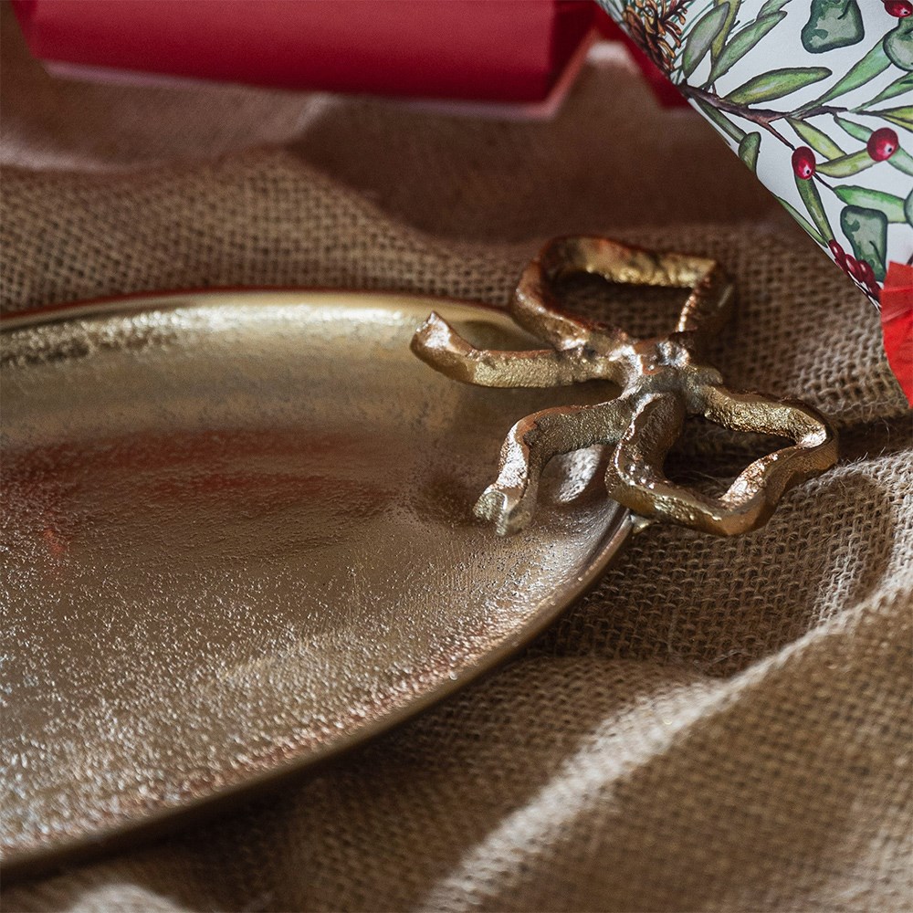 Gold bow detail plate