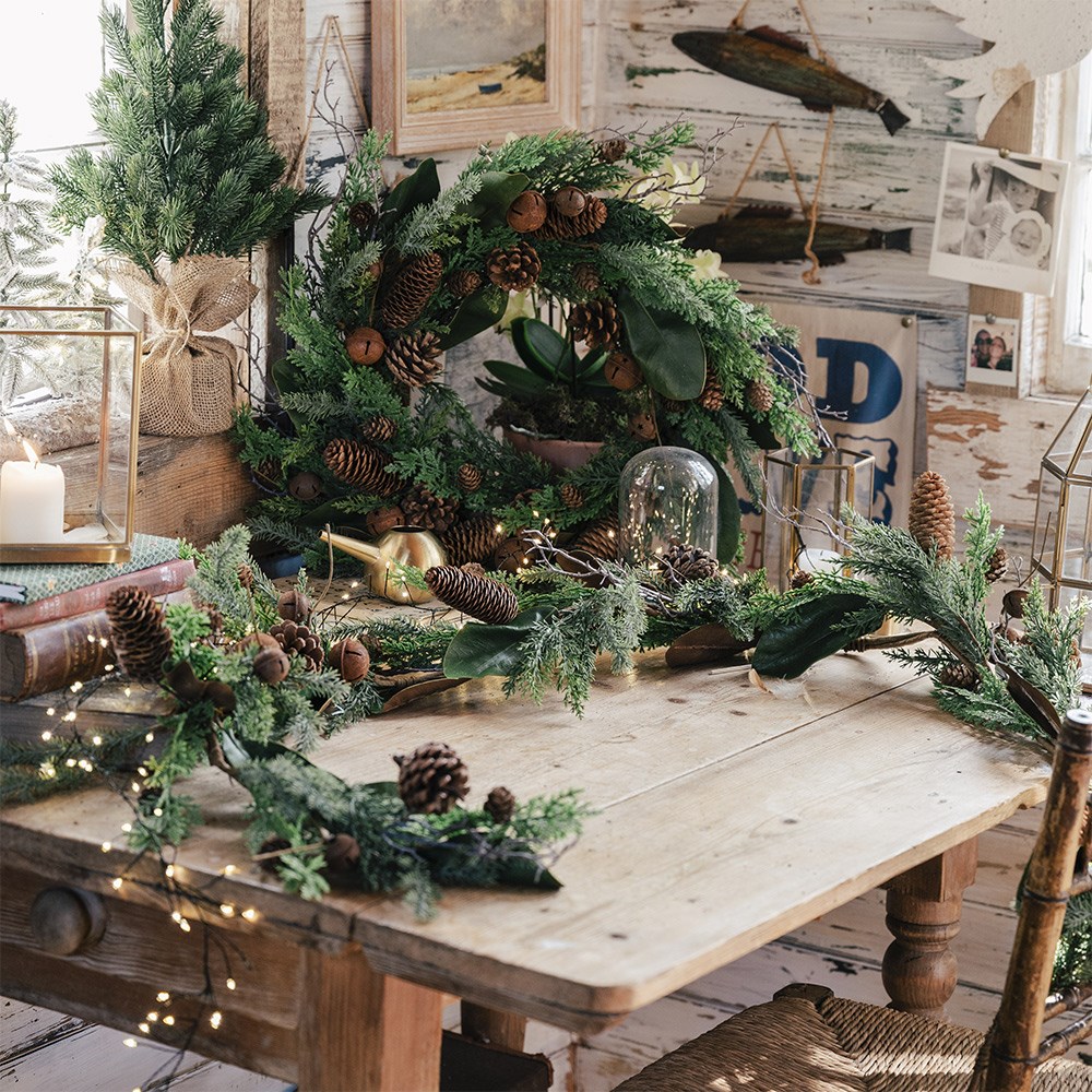 Green garland with rusty bells
