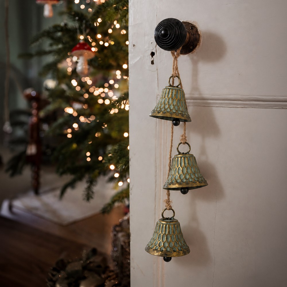 Three verdigris bells